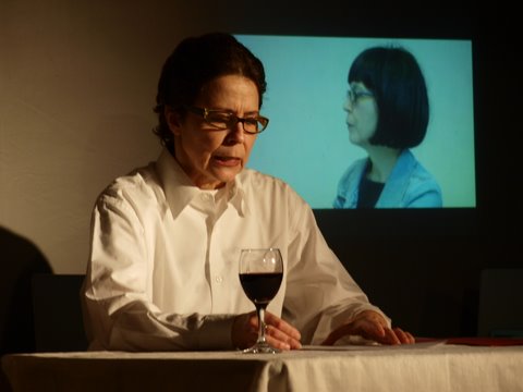 Johanna Householder: <em>The subject of art: Badiou, Cobain</em>, reading a lecture, 2010, performance shot, <em>CHAOS</em>; photo Jordan Hutchings; courtesy CHAOS
